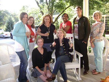 Donw Home Writing School on the porch with friends